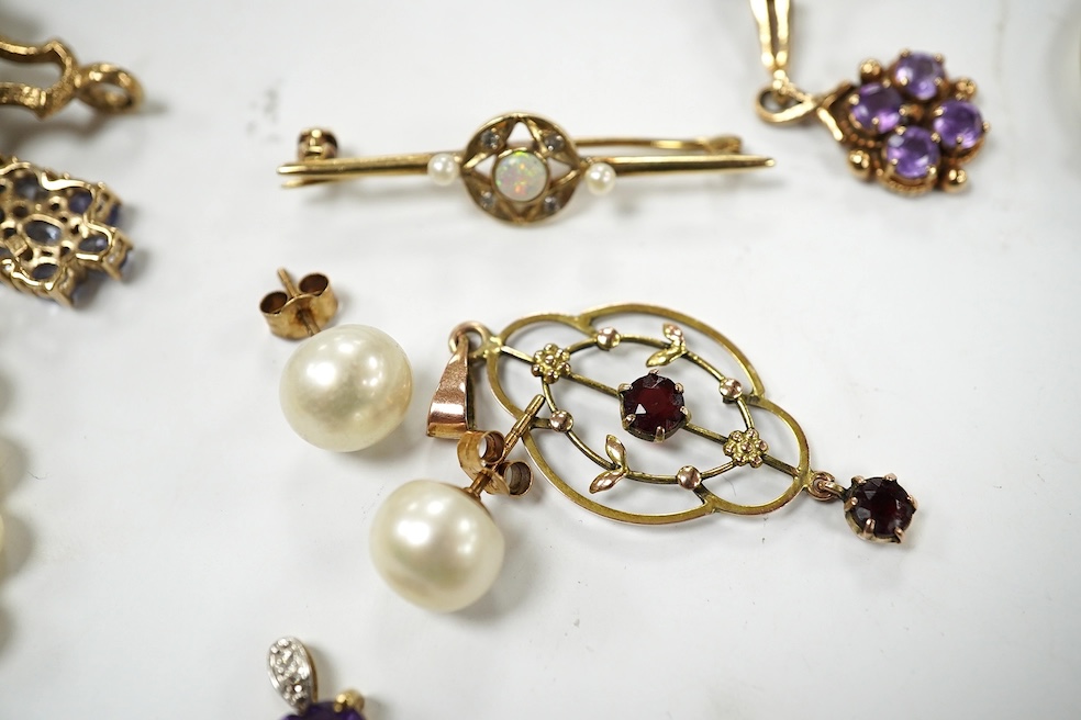 A group of assorted mainly modern 9ct and gem set jewellery including pendants, rings, bracelet, fob seal, ear studs, bar brooches, etc. and a single strand cultured pearl necklace. Condition - poor to fair to good.